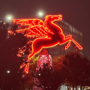 The Magnolia Building's red neon pegasus