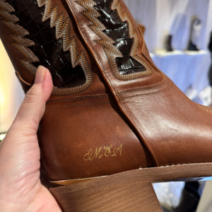 gold foil on brown boot