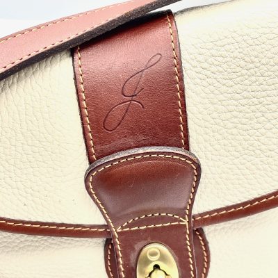 Chapman Calligraphy Leather Debossing on Coach purse